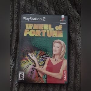 𝅺WHEEL of Fortune (Sony PlayStation 2, 2003) with booklet. Scratch free disc.